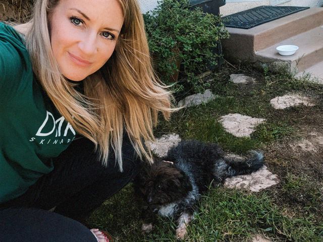 With a puppy in the yard